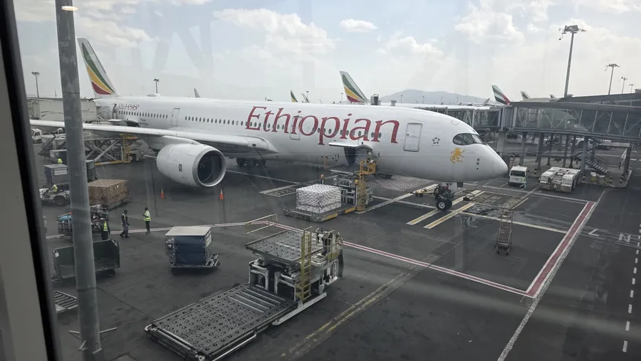 Ethiopian Airlines aircraft at the jetbridge — airport critical facility environment