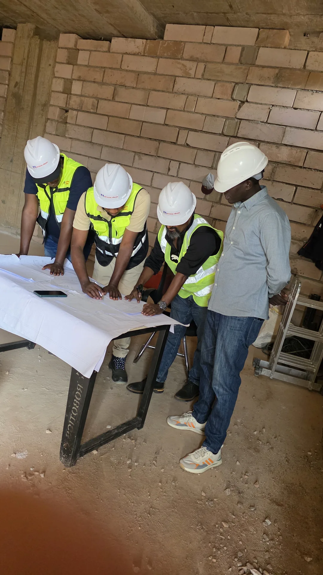 Engineers reviewing plant documentation during an energy assessment