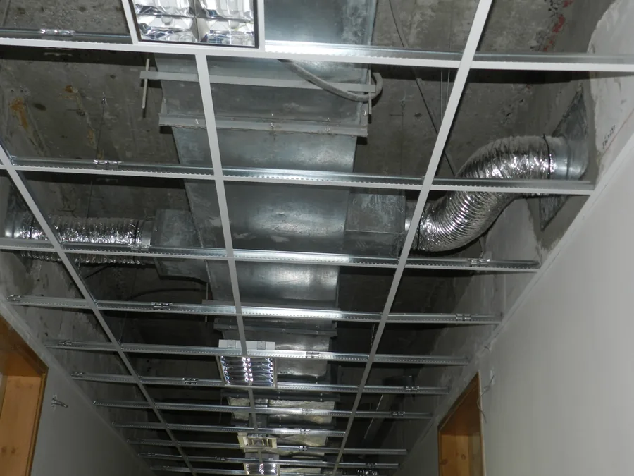 Ductwork, flexible connections and suspended ceiling grid installed at Yekatit 12 Hospital